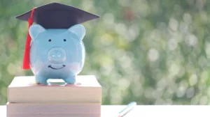 piggy bank with grad hat