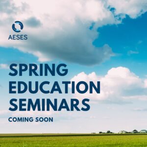 Blue sky with clouds, AESES logo and text overlay Spring Education Seminars Coming Soon